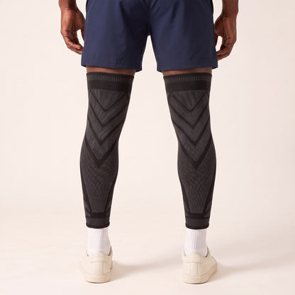 Back view of both legs in MotionKnit sleeves, showing the patterned knit behind the knee and calf